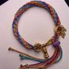 Woven Buddhist Bead Bracelet - A unisex hand-woven rope bracelet.