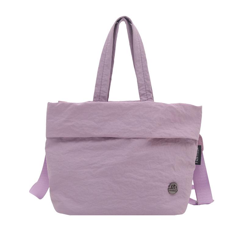 

2025 new trendy casual simple handbag fashionable versatile shoulder bag light solid color commuter messenger bucket bag фиолетовый