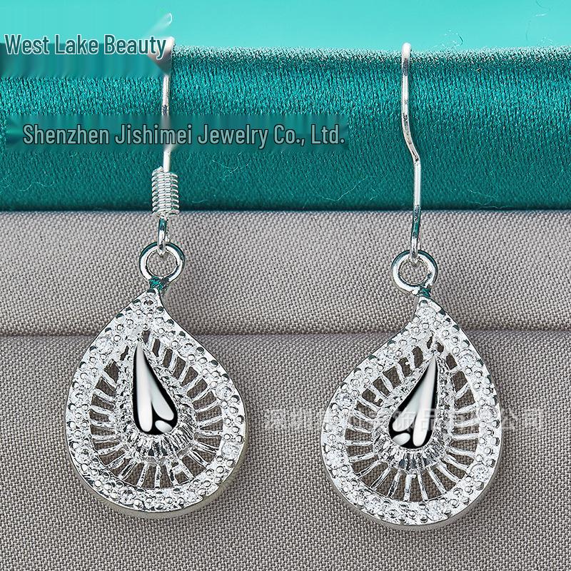 Silberne hohle Wassertropfen- Bananenblatt-Ohrringe für Damen