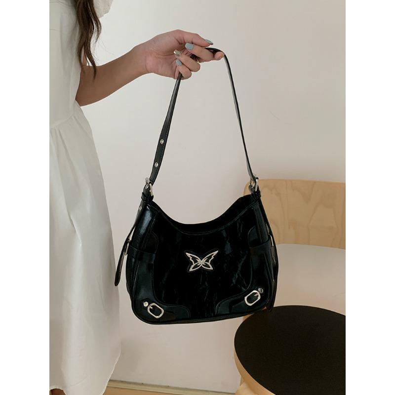 

New butterfly contrasting rivet locomotive armpit bag fashionable texture shoulder messenger bag чёрный