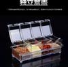 Scatola Organizzatore Trasparente per Spezie da Cucina con 4 Scomparti e Coperchi Individuali, Incluse 4 Cucchiaini Dosatori e Base per Facile Conservazione e Accesso