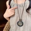 Bohemian wood beads beaded hollow round pendant necklace light luxury high-end sweater chain niche necklace accessories