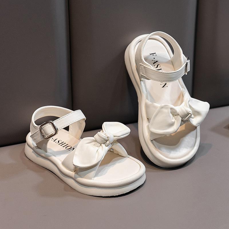 2024 Kindersandalen für Mädchen Neue Sommer Prinzessin Schleife Strandschuhe Mode Kinder Lässige Schulsandalen Vielseitige Unifarbe