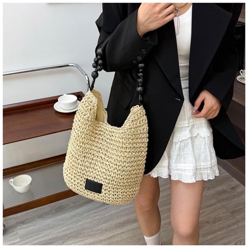 Taschen Damen Retro geflochtene Taschen Fauler Stil große Kapazität ausgehöhlte Strandtaschen Kontrastfarbe Unterarm-Beuteltaschen