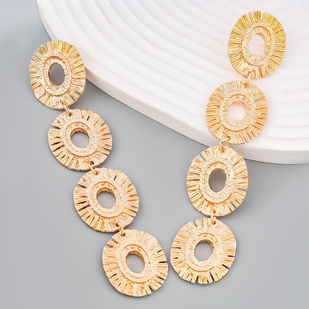 

«Европейские и американские многослойные геометрические полые серьги — стильный богемный дизайн для женщин» золотой