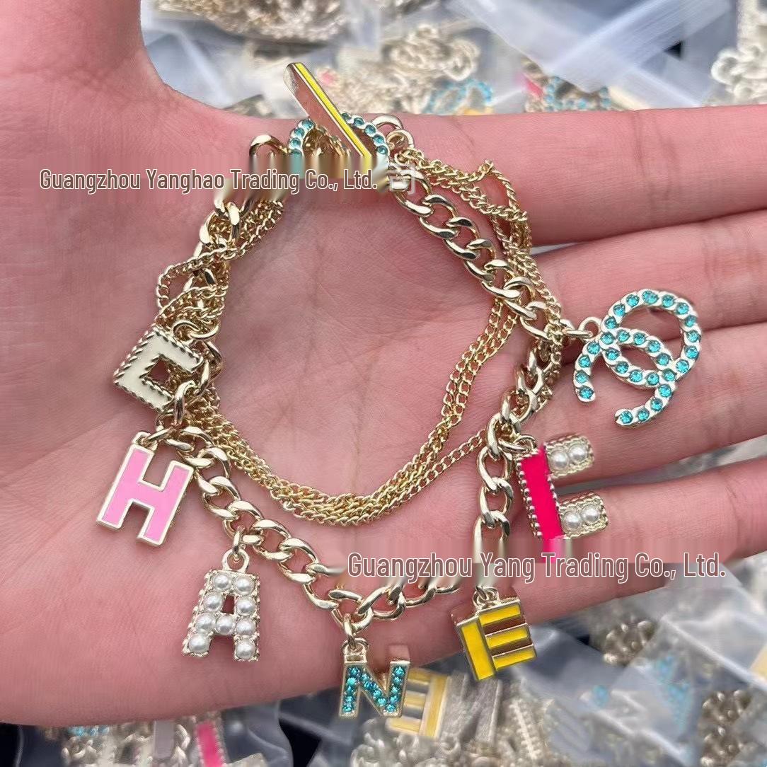 Набор женских украшений Seiko: Многослойное колье Double C и браслет с цветными бриллиантами