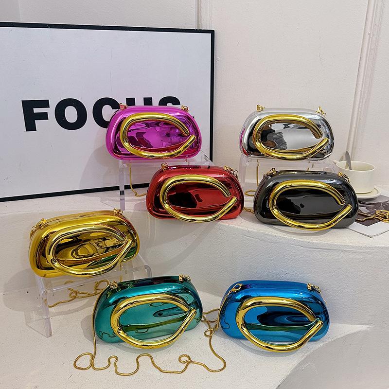 Handbag damska z handlu zagranicznego 2025 nowa europejska i amerykańska moda metalowa torebka na nadgarstek spersonalizowana błyszcząca łańcuszkowa listonoszka torebka wieczorowa