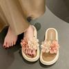 2025 summer new two-color flower platform slippers women's open-toe hollow one-word drag middle heel casual sandals