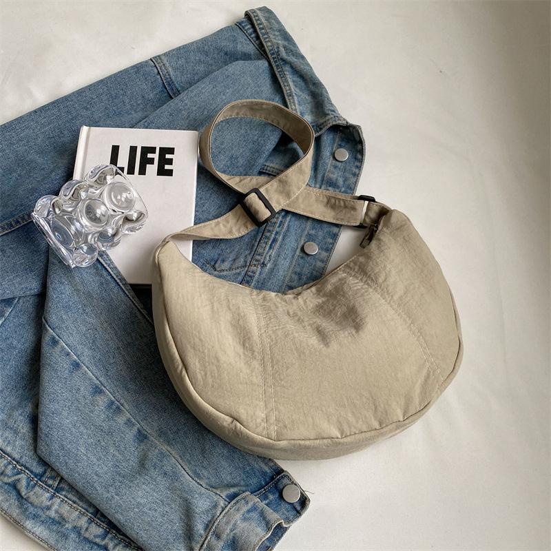 

Women s messenger bag large-capacity student leisure shoulder bag sports bag spring and summer new dumpling bag
