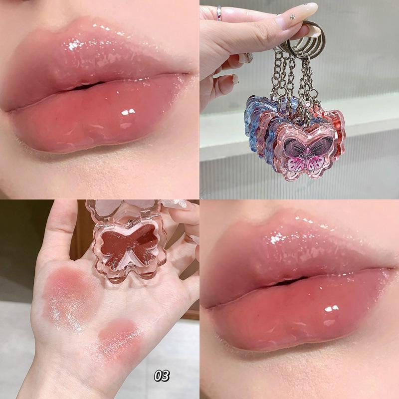 OUOII Luminous Butterfly Wing Lip Tint: Glossy, Plump, Long-Lasting, and Moisturizing Lip Gloss with Subtle Color.