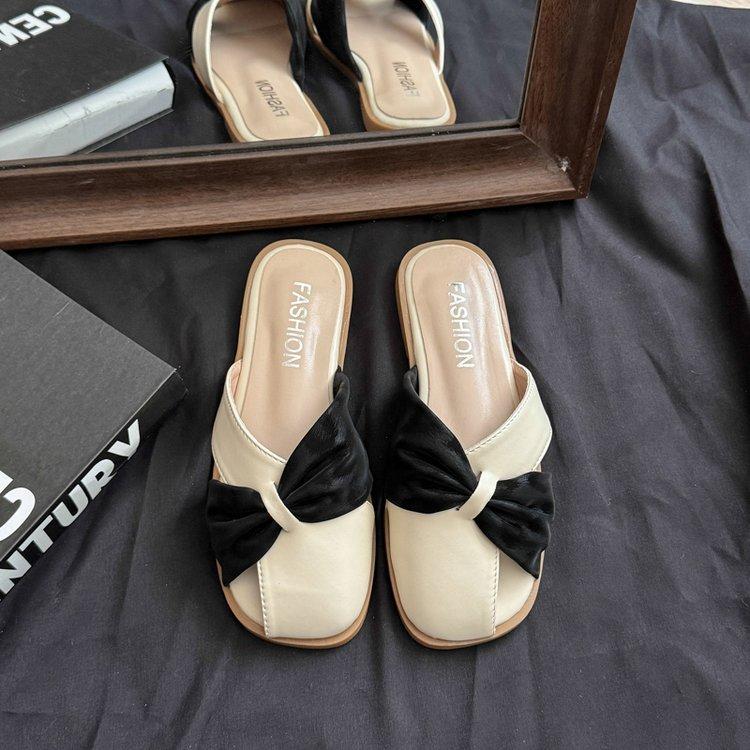 

French evening breeze ins temperament girl campus one-pedal slippers outside wearing non-slip flat-bottomed bag head half-drag cool slippers 35 чёрный