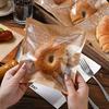 100PCS Cartoon Pattern Food Packaging Bag Heat-resistant Transparent Window Kraft Paper Packing Bag Kraft Paper Oil Resistant