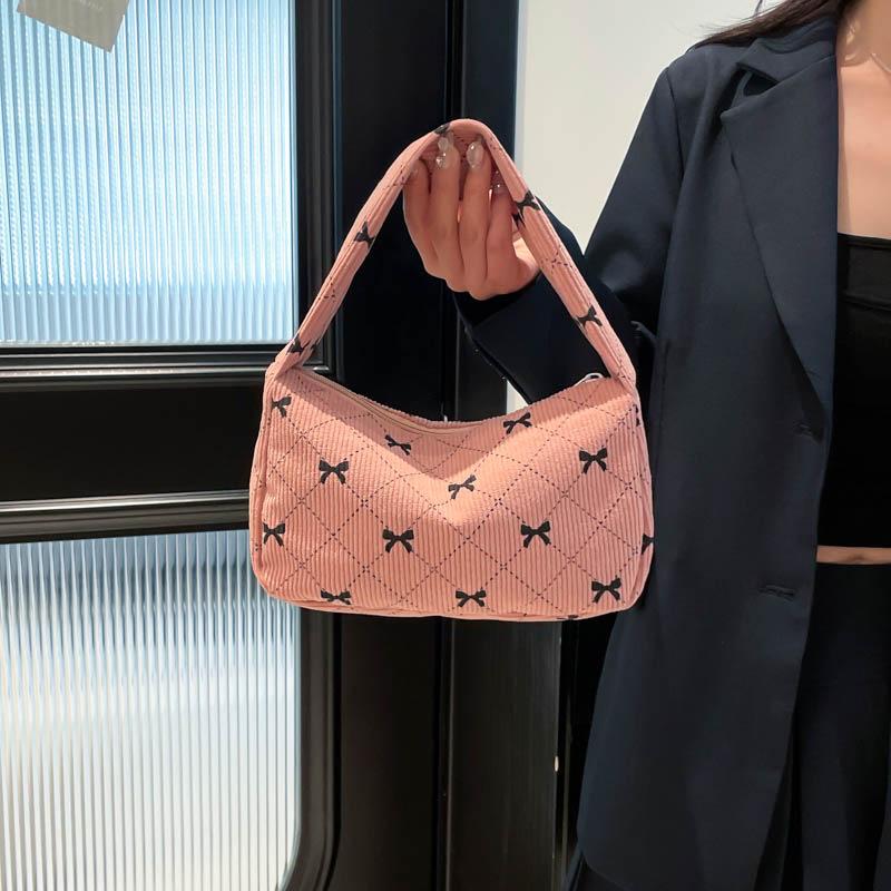 

Corduroy fashion printed hand satchel women s new autumn armpit bag simple fashion shoulder bag рожевий