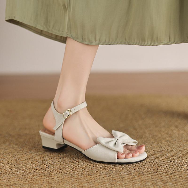 Summer sandals women's new Korean version flat-soled sandals women's rubber soft-soled large and small size women's shoes back empty solid color bow