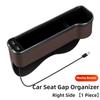 Riempitivo Fessura Sedile Auto Portabicchieri LED Cambia Colore 7 Colori Scatola Organizer Portaoggetti Fessura Auto Con Caricatore 2Usb Accessori Auto