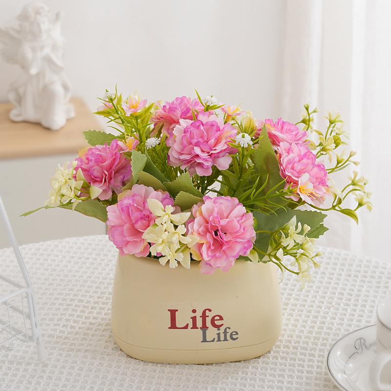 Living Room Decor: Artificial Sunflower and Green Plant Arrangements, Small Potted Plants, and Plastic Bouquets