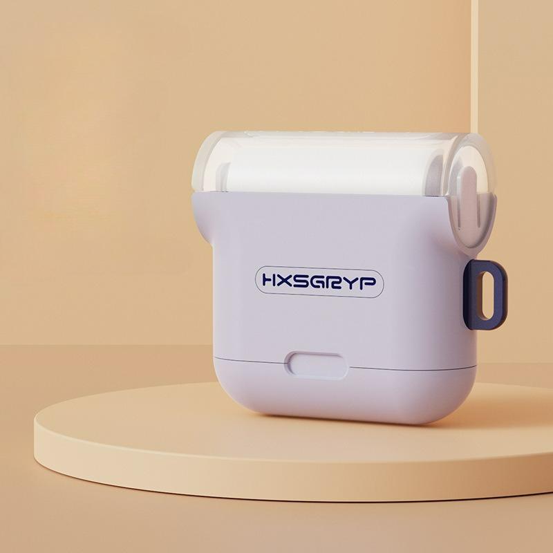 

Portable mini hair sticky roller Household hair remover Sticky clothes Sticky cat hair Tear type Replaceable