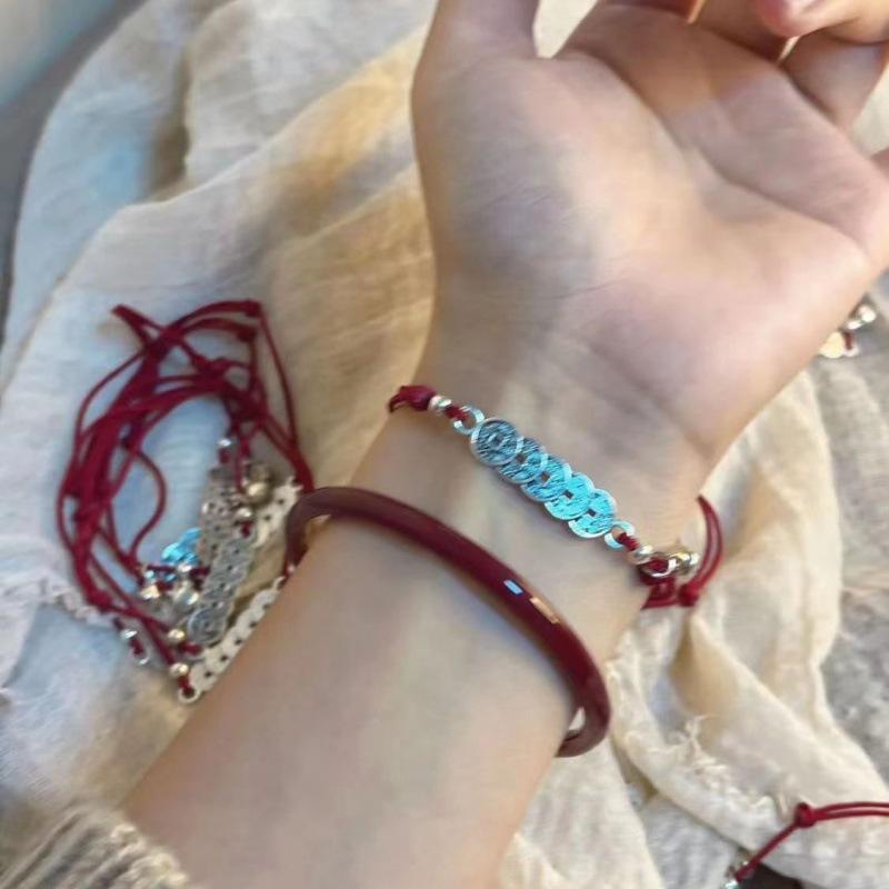 Xiaohongshu Woven Luck Bell Bracelet with Five Emperors Coins, Adjustable Red String for Birth Year, Chinese Style.