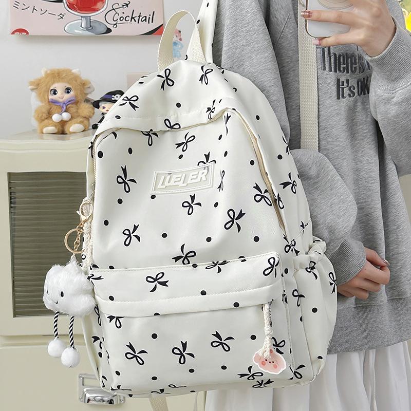 Schoolbag new student schoolbag cute large capacity floral junior high school backpack girl fresh bow ins backpack