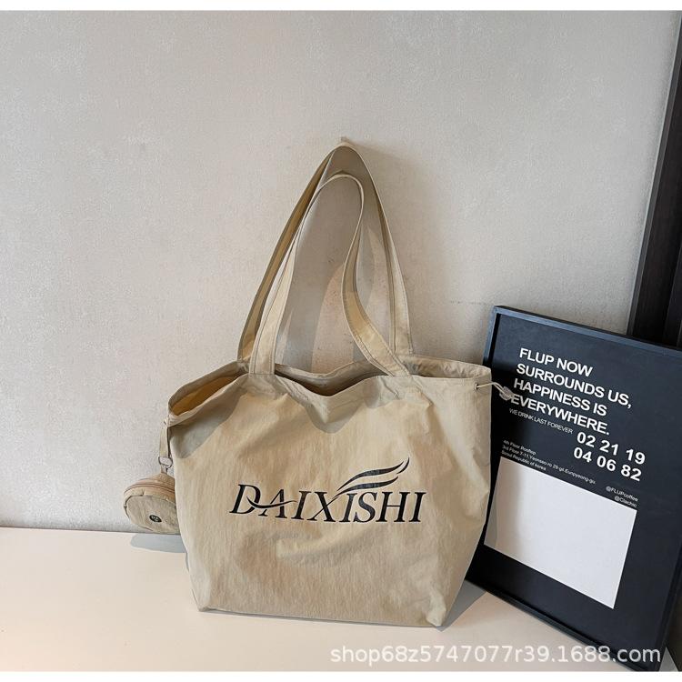 

Fashion texture popular tote bag underarm bag women s 2025 new large-capacity canvas bag niche portable shoulder bag хакі