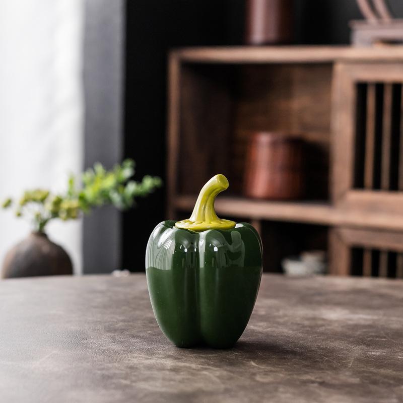 Chili shaped ceramic sealed storage jar with decorative design, suitable for use in home offices and restaurants