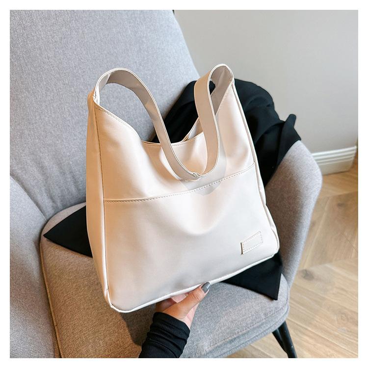

Жіноча сумка великого об’єму Нова м’яка шкіряна приміська сумка 2024 року для студентів коледжу Сумка на плече Сумка-месенджер білий