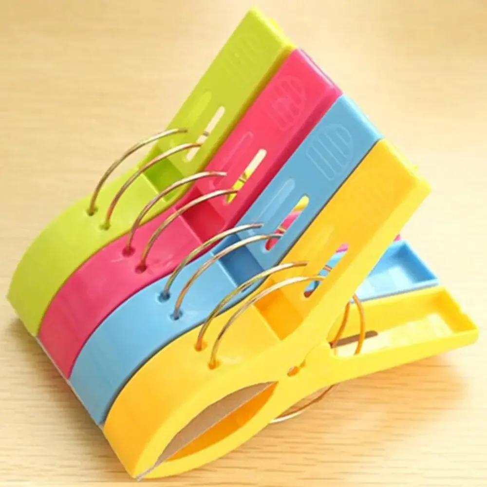 2025 New 4Pcs Beach Towel Clips Plastic Quilt Pegs for Laundry Sunbed Lounger Clothes Pegs Home Bathroom Organization Tools
