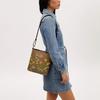 Coach Khaki Signature Canvas Bucket Bag with Floral Print & Gold Hardware for Daily Use