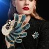 Boutique blue painted peacock brooch, exquisite versatile rhinestone suit pin, female Korean version of cute enamel accessories