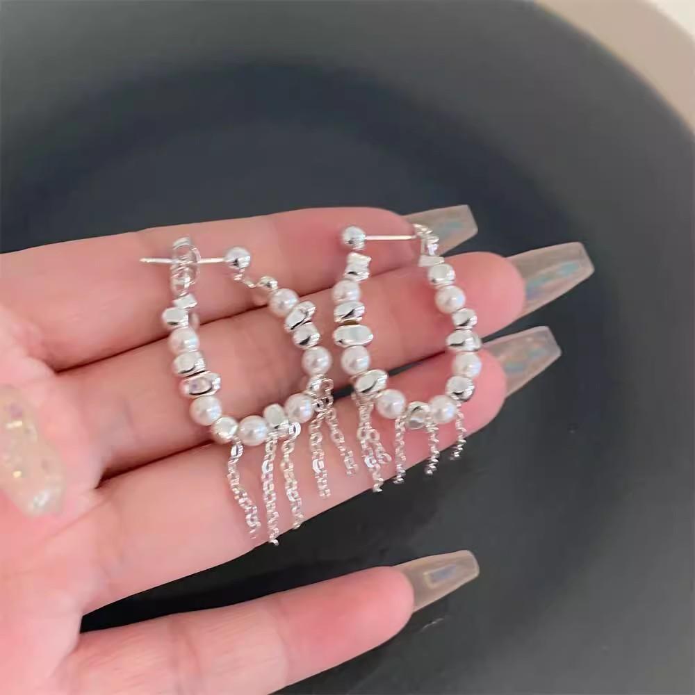 

French broken silver pearl long fringed earrings women s light luxury niche high-end stud earrings temperament versatile ear jewelry