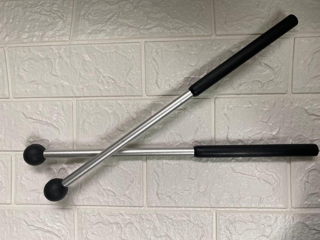 Robuster Elektronischer Drumstick-Ständer mit Mehrfarbigen Übungsschlägern und Handgelenköffnung