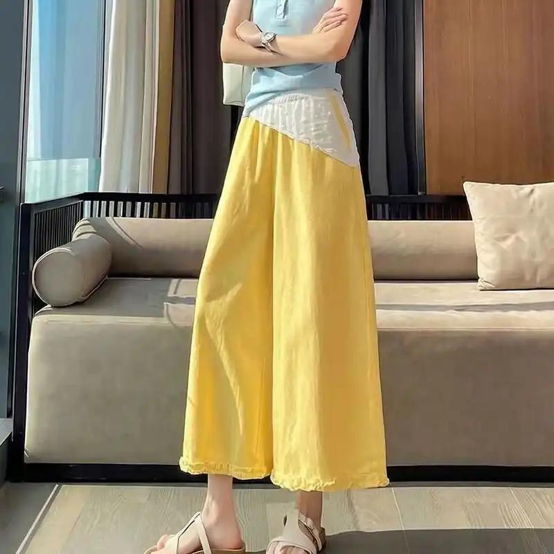 

Women s Light Blue Denim Wide Leg Pants With Polka Dot Lace Waist And Ruffle Hem M жовтий