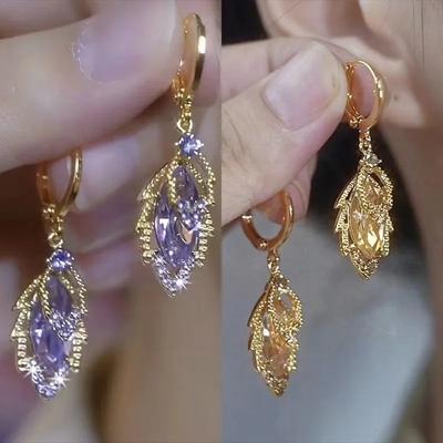 Orecchini da donna in foglia d'oro con fibbia ad ardiglione, stile di lusso leggero e di alta qualità, orecchini viola con diamanti e temperamento.