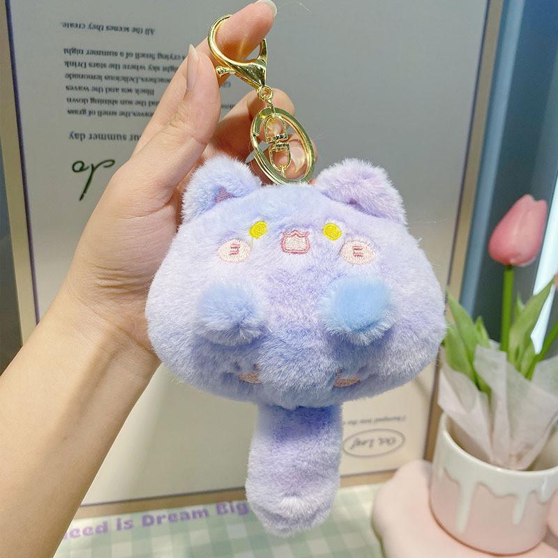 

Cat Plush Whimsical Toy With Squeaking Feature In Cheerful Variants Color Blue Purple