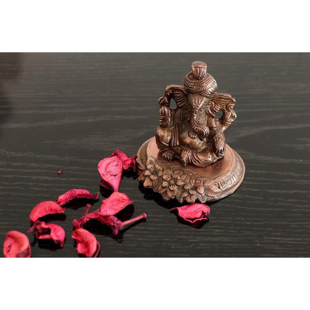 Metal Lord Ganesha On Flower Figurine