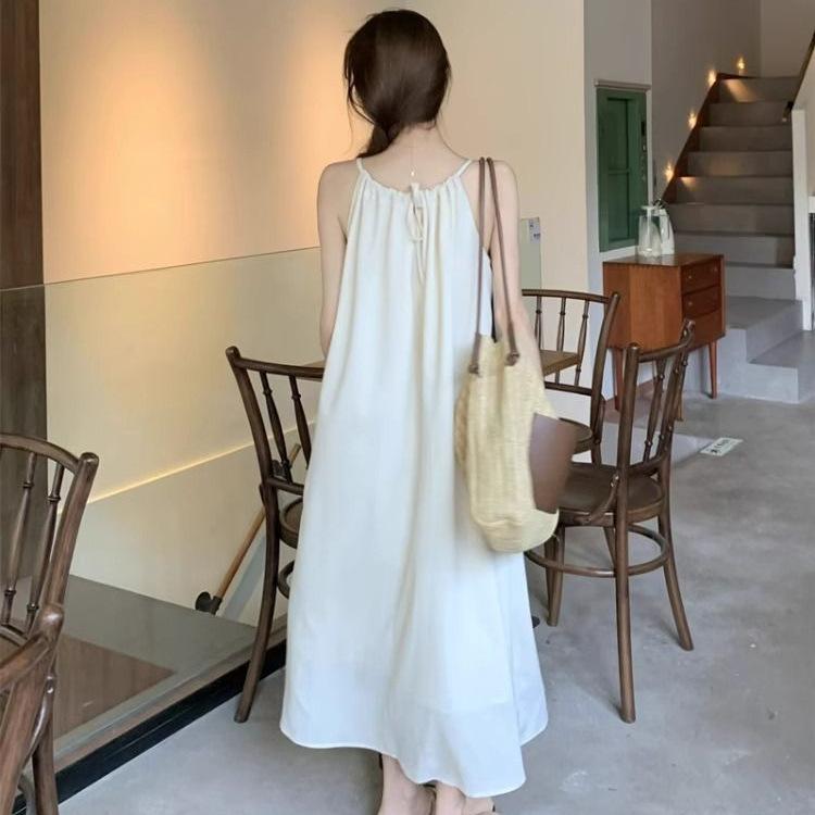 Summer new French gentle wind suspender dress women's design sense loose and thin seaside vacation beach dress