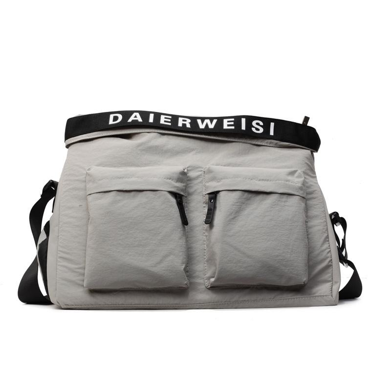

Japanese mailman bag, simple letter sports fitness bag, large-capacity business travel bag, fashionable street diagonal span bag for women серый