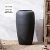 Jingdezhen Black Coarse Pottery Floor Vase: Modern Minimalist Japanese Decor for Hotel, Homestay, or Living Room.