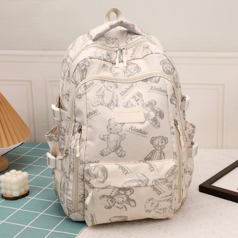 Simple travel computer backpack casual solid color bear shoulders junior high school students large capacity student bag schoolbag