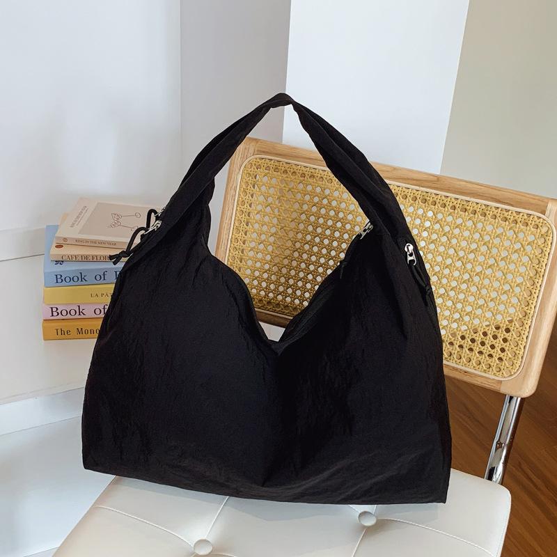 

Large-capacity tote bag women s new simple solid color lazy wind shoulder bag casual commuting shopping cloth bag чёрный