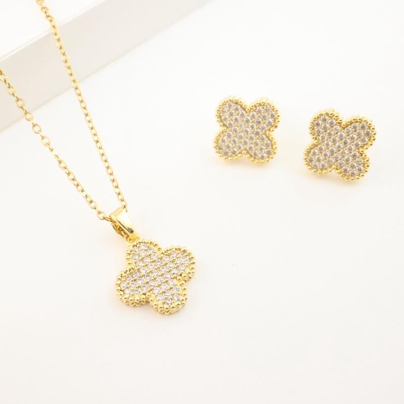 Boucles d'oreilles en forme de trèfle à quatre feuilles de style rétro, boucles d'oreilles de luxe polyvalentes en strass brillants pour femmes