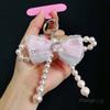 Mesh bow pearl bracelet women's ins fashion Xiaoxiangfeng mobile phone pendant mobile phone lanyard short wrist
