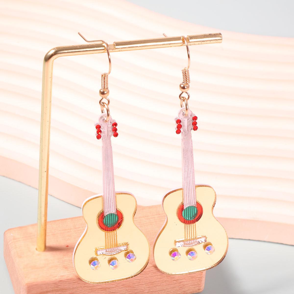 

Unique acrylic mirror surface guitar ear hooks with a personalized, fashionable and creative design sense