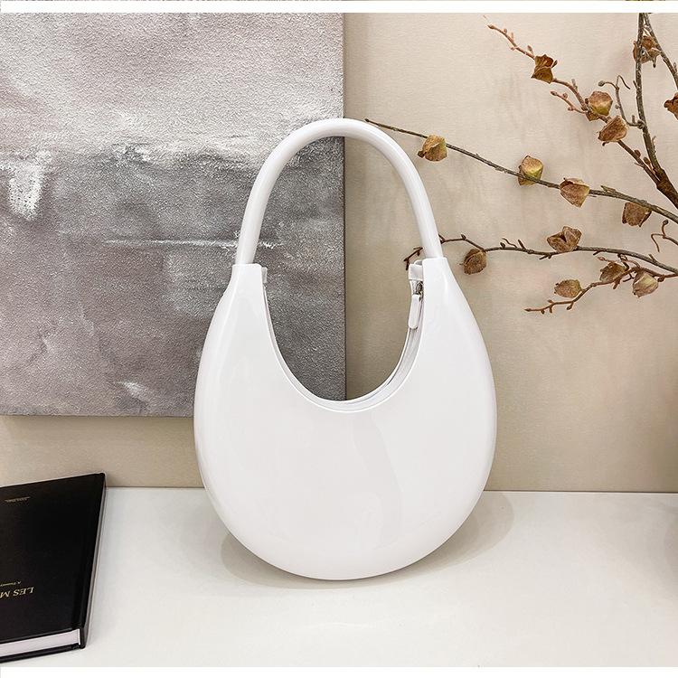 

Niche patent leather jelly bag women s large-capacity new summer shoulder armpit bag commuter dumpling bag бежевий