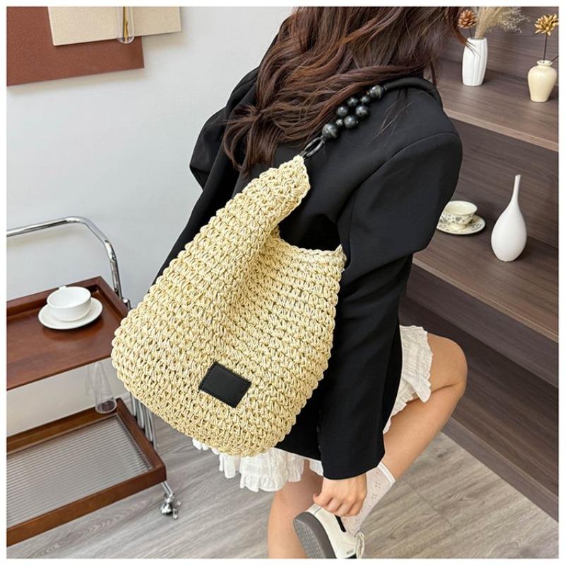 Taschen Damen Retro geflochtene Taschen Fauler Stil große Kapazität ausgehöhlte Strandtaschen Kontrastfarbe Unterarm-Beuteltaschen