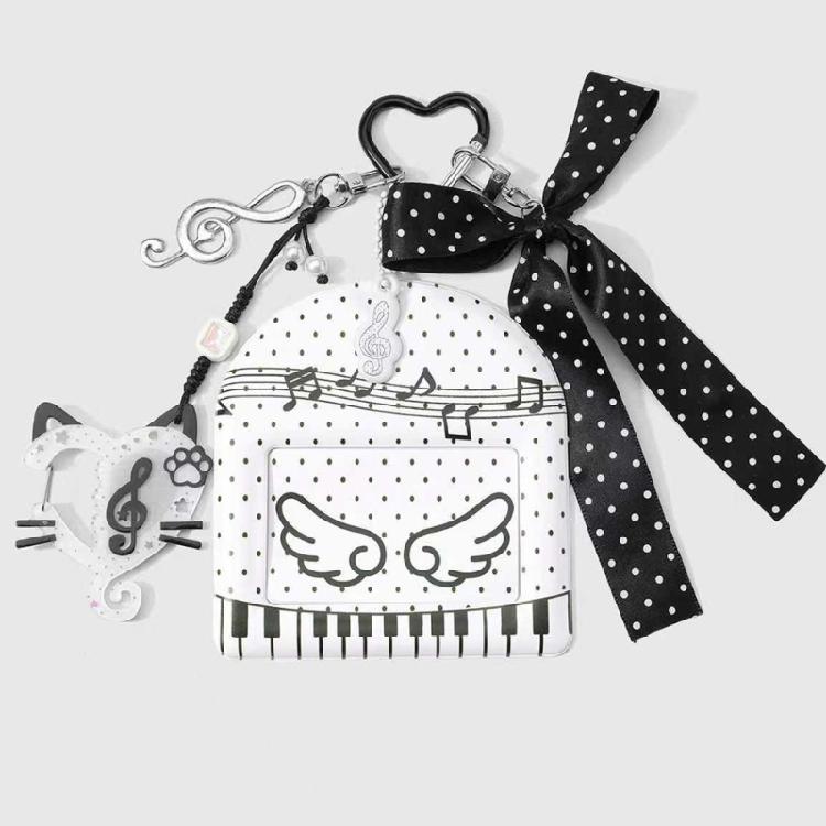 Trendy Musical Note Keyring Key Holder Featuring Piano Keys And Delicate Bowknot Perfect For Music Enthusiasts