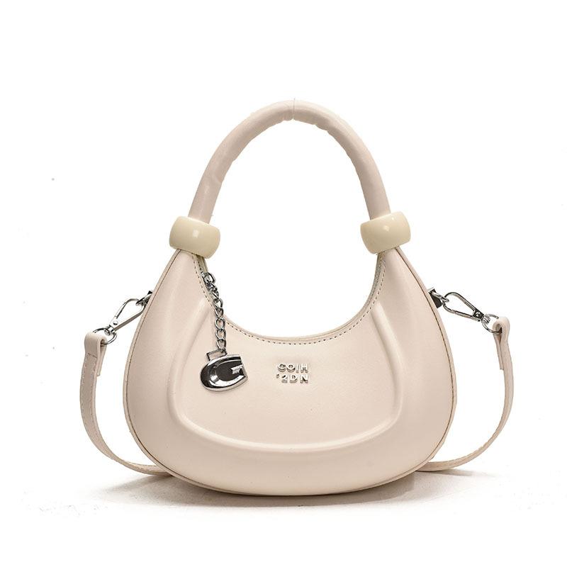 Trendy new product fashion personalized texture niche hand carry crescent bag Korean version casual versatile commuter solid color messenger bag