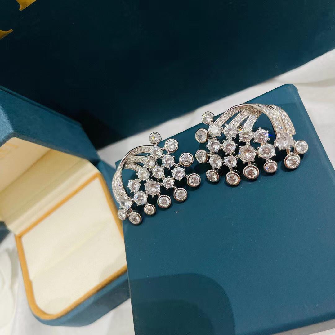 

Новый тренд 2023 года Высокое качество Класс Популярный бренд Юбилейные серьги Серьги-пусеты Полностью циркониевые Белое золото Звезды метеоритного дождя