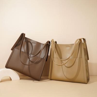 Neue große Kapazität Rindsleder Tragetasche Damen Einfach Pendeln Vielseitig Umhängetasche Nischen Design Leder Handtasche