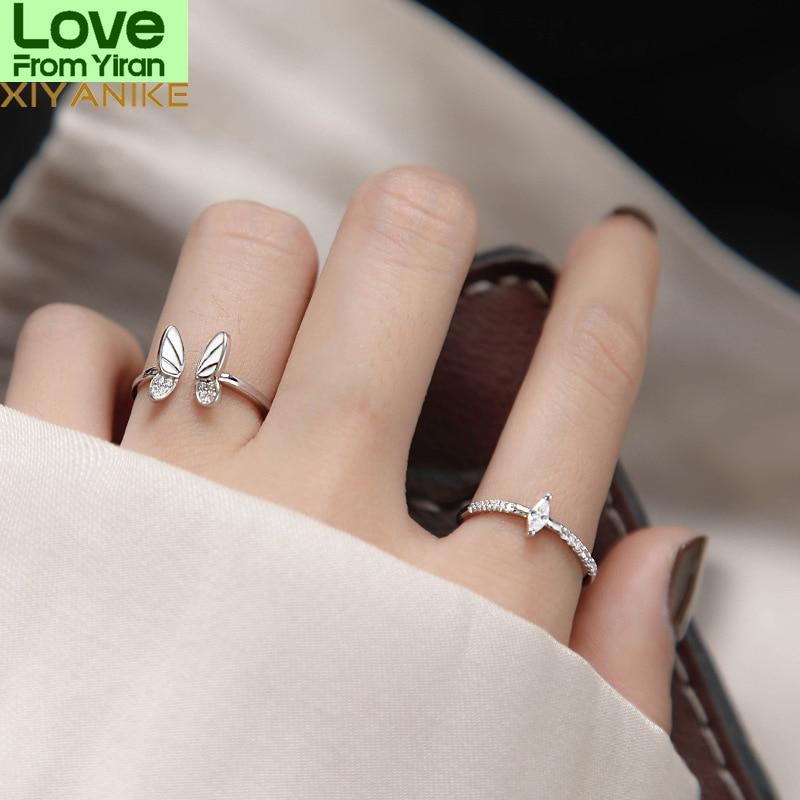 

Xiyanike 925 пробы стерлингового серебра корейский белый трехмерный бабочка циркон двойной комплект колец уникальный дизайн насекомое сочетание Resizable